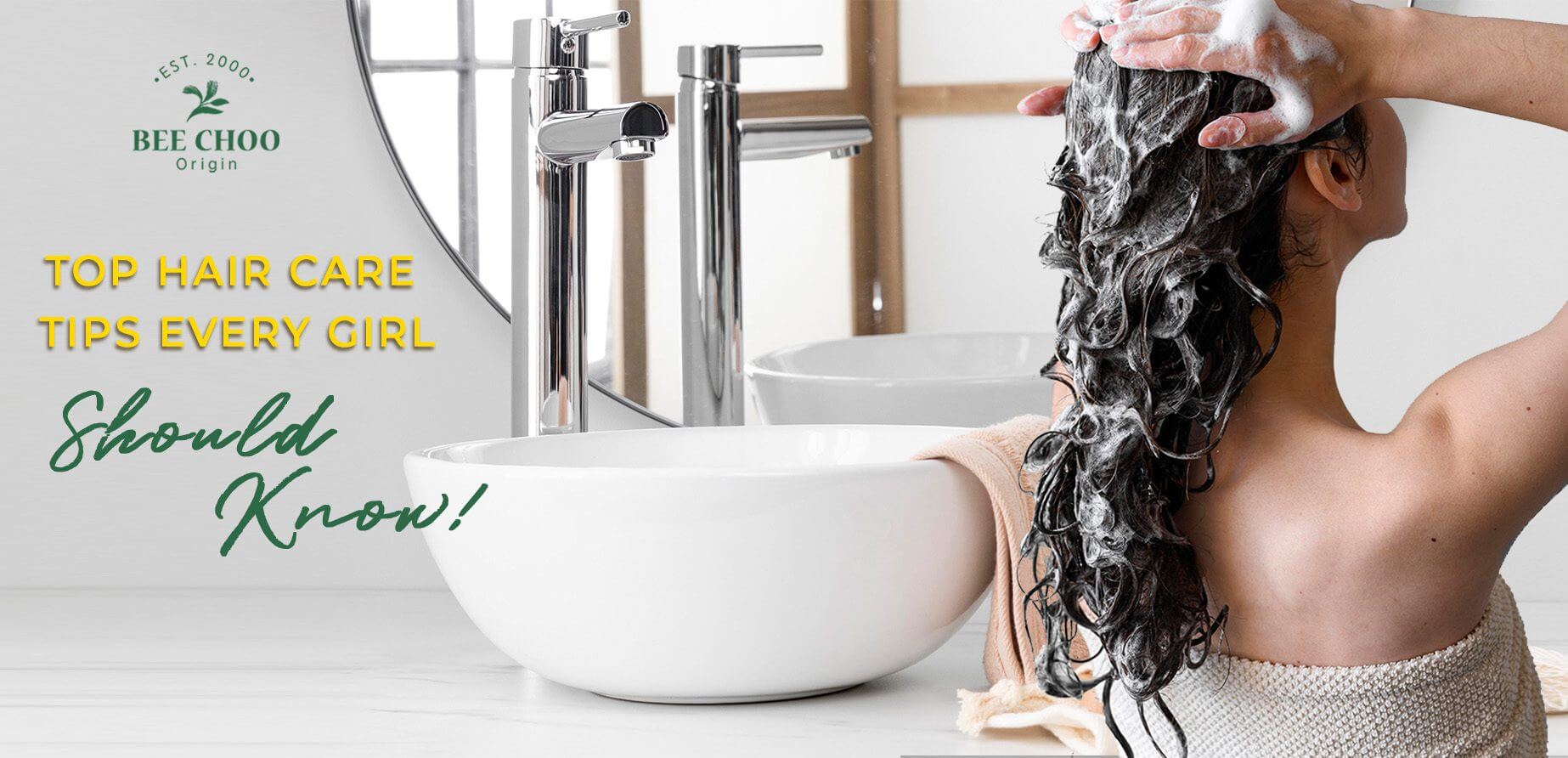 Top hair care tips every girl should know text next to a lady washing hair.